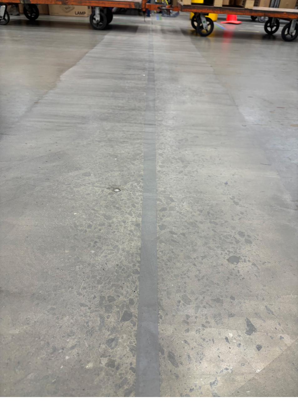 Full length joint fill down a warehouse aisle